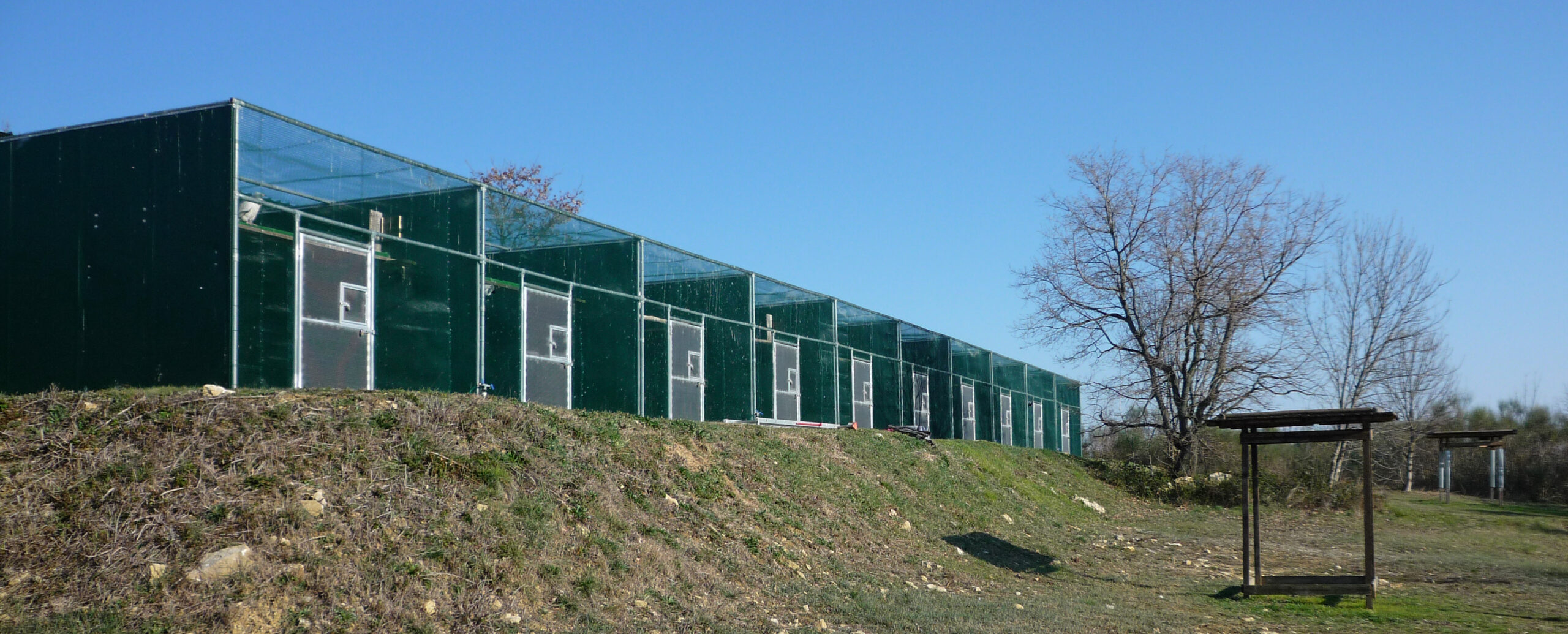 Aviaries and feeders at the CERM Endangered Birds of Prey Centre